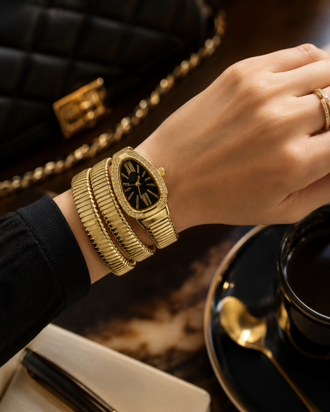 Luxe Serpentine Gold Wrap Bracelet Watch – Crystal Bezel & Black Dial